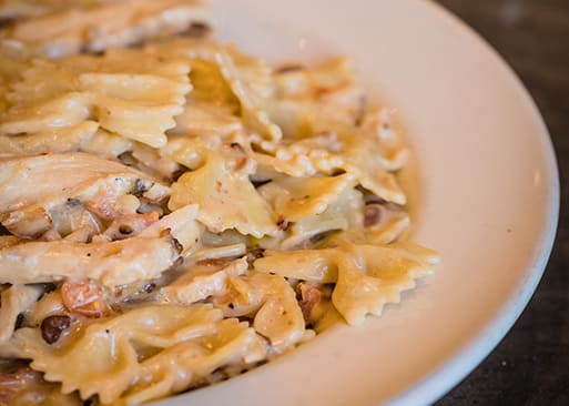 Photo 1 of 4: Johnny Carinos - Sioux Falls