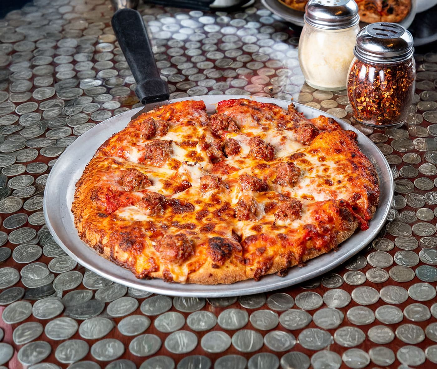 Photo 1 of 4: Glass Nickel Pizza